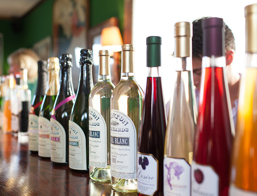 A dozen wine bottles
